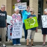 A Stop Critical Race Theory demonstration outside of a Cincinnati area school district Monday, August 10, 2021