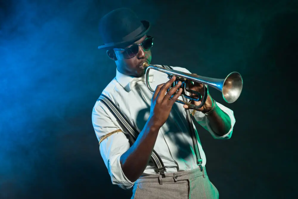 black man playing trumpet