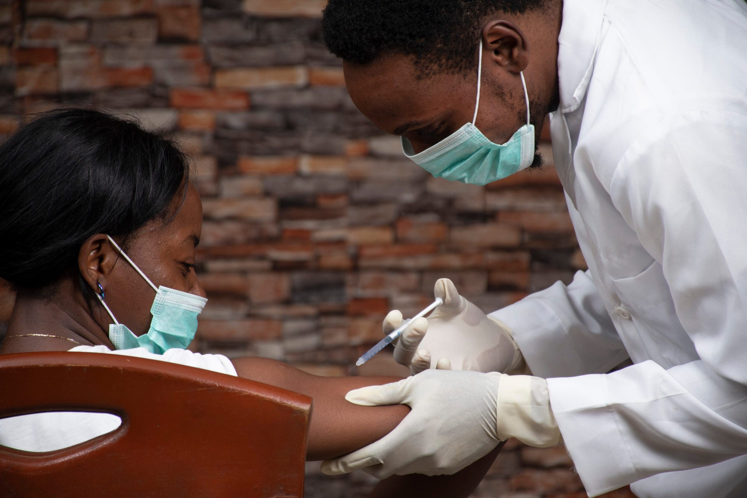 Young woman getting a vaccination 